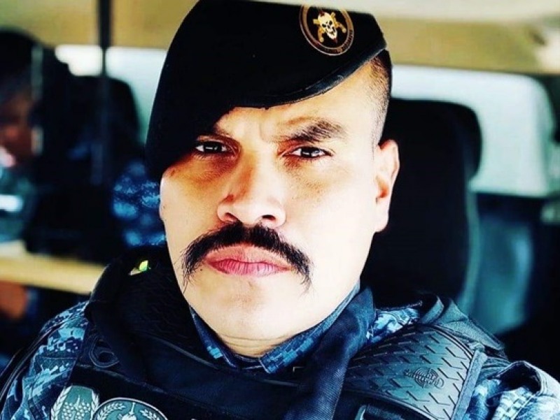O policial militar Elder Neves de Oliveira, de 36 anos, foi morto com dois tiros na região da cabeça, dentro de uma ca (Foto: Reprodução)